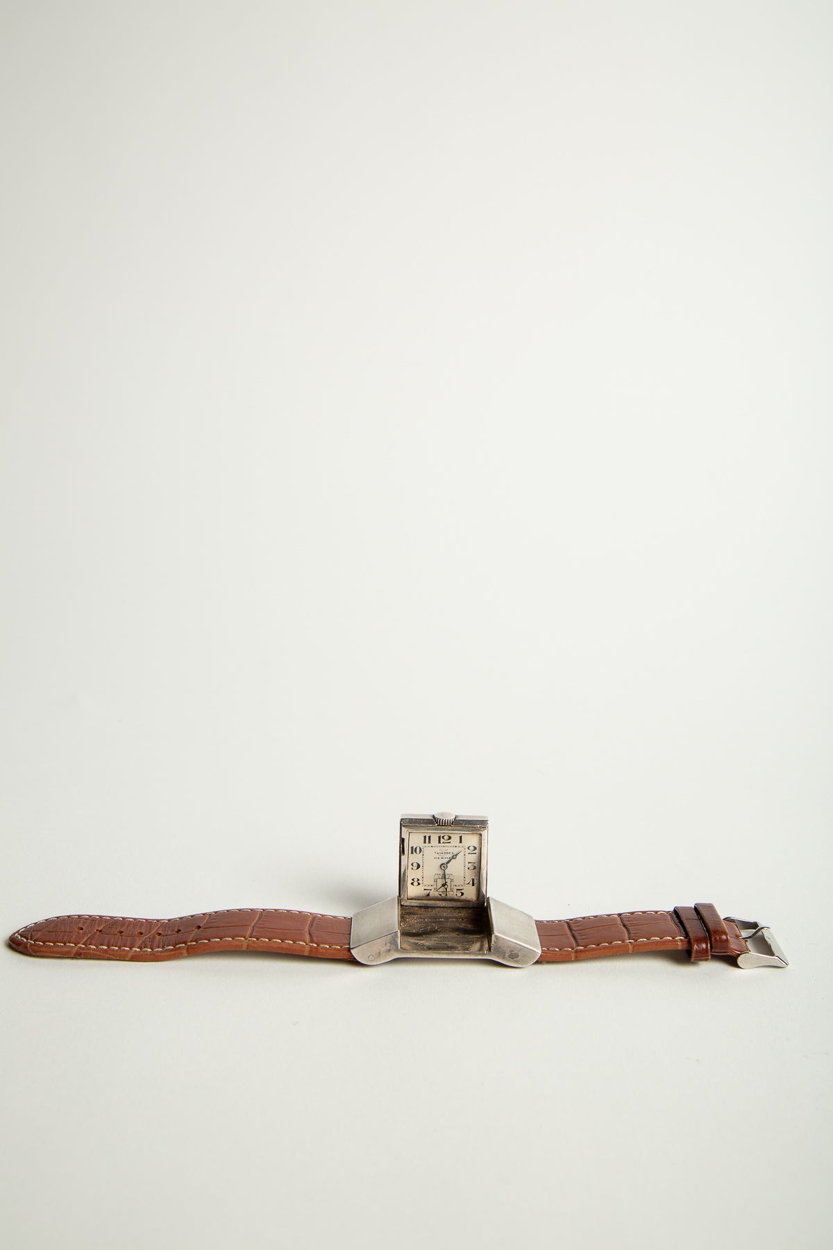 HERMÈS | 1920'S STERLING SILVER GOLF BELT WATCH