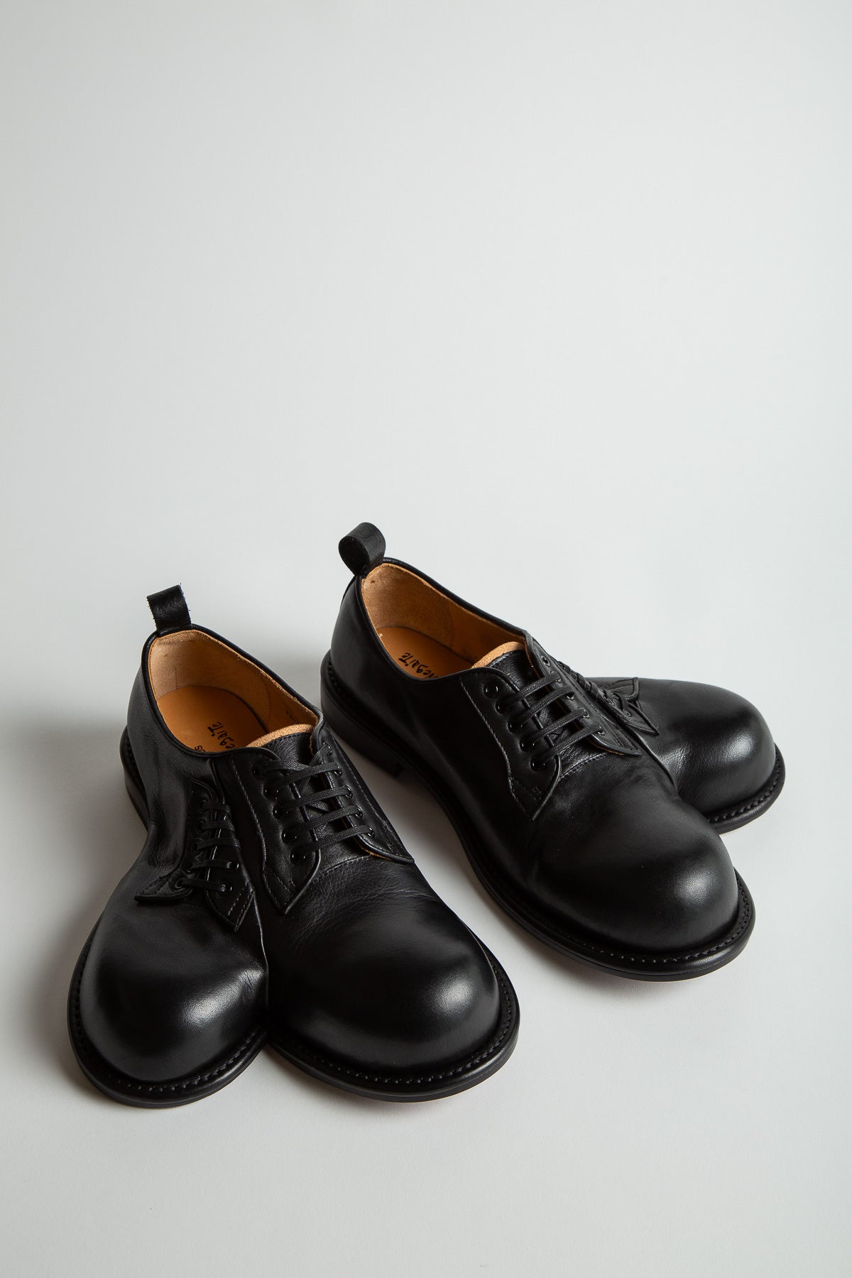 Comme des Garçons Homme Plus asymmetric leather Derby shoes - Black