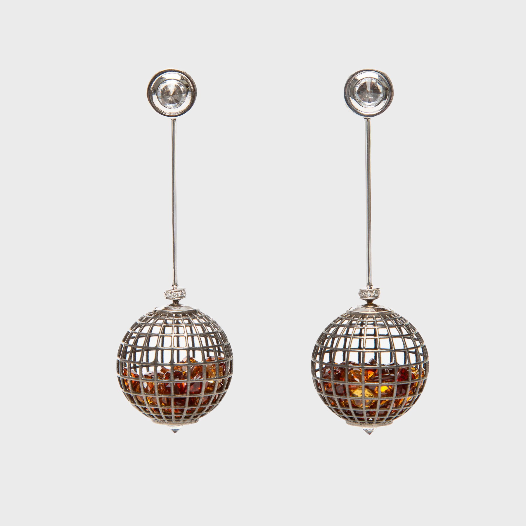 Outlet globe earrings with antique touch